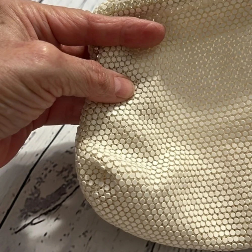 Dainty special occasion clutch with snap hinge closure cream